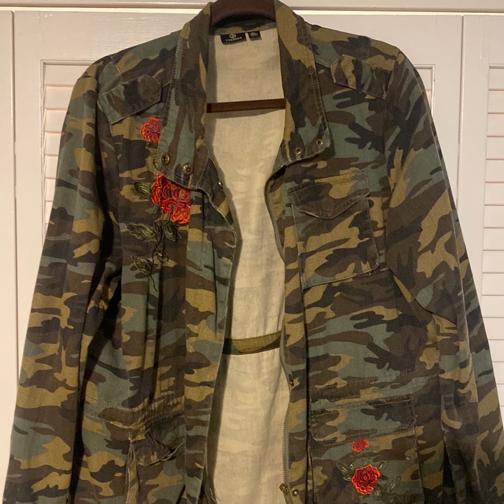 Super cute camo jacket with rose embroidered detail!